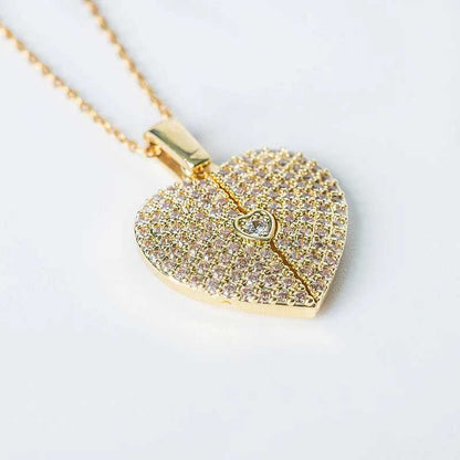 Elegant gold open close heart necklace